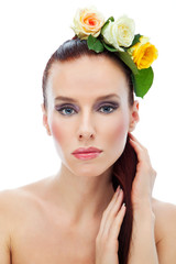 Woman with makeup and flower in hair