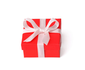 Little red gift on red background