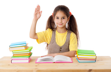 Girl with books and raises his hand up