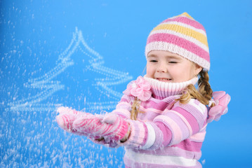 the little girl with the Christmas tree