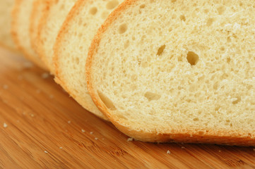 The cut bread on a chopping board