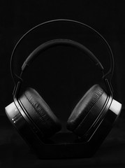 Fototapeta na wymiar Headphones on black background