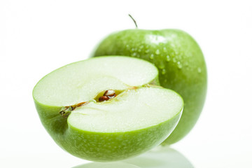 Green apple and slice