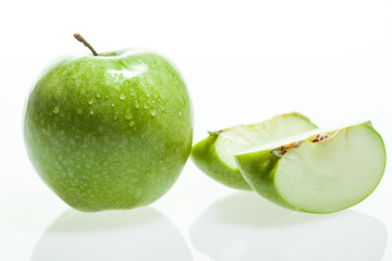 Green apple and slice