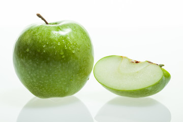 Green apple and slice