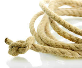 roll of rope with knot, isolated on white