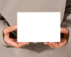 Obraz premium Woman hands holding a blank white board