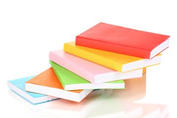 Stack of multicolor books  isolated on white