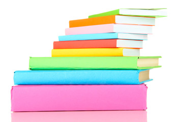 Fototapeta premium Stack of multicolor books isolated on white
