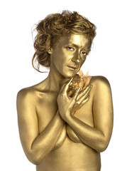 Golden woman with flower