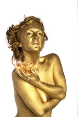 Fototapeta na wymiar Golden woman with flower
