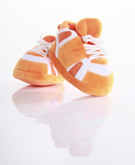 Orange baby boots isolated