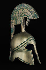 Ancient greek helmet replica on black background - 47804927