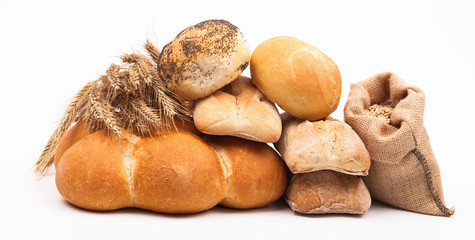 assortment of baked bread isolated on white background