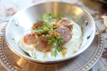 fried egg stuff with hot pan