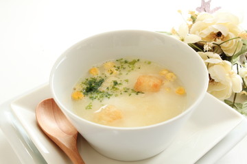 Corn potage with toast and herb on top
