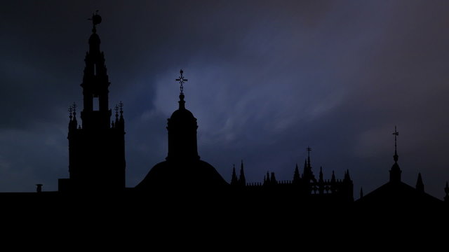 Spain Seville Cathedral and Giralda Tower storm