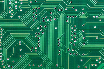 Close up of a printed green computer circuit board
