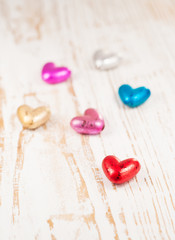 Hearts on wooden background