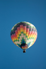 hot air balloon over farm land