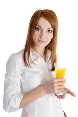 Young woman drinking orange juice. isolated on white