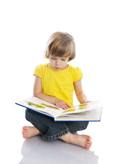 little girl reading a book. isolated over white