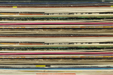 Old record carton covers  stacked in pile