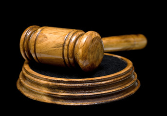 gavel close up on black background