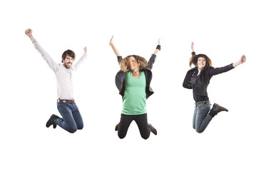 Fototapeta na wymiar three happy young people jumping