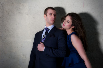 Stylish young couple posing outdoors