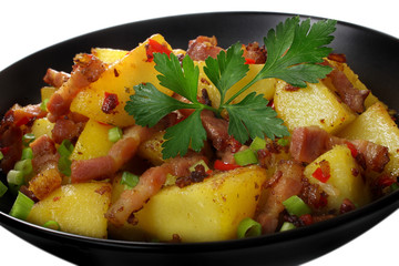 Fried potatoes with bacon, onions and paprika