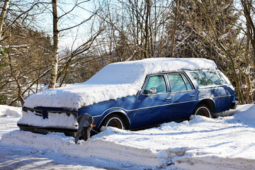 parking old snowy car in winter on Czech mountains
