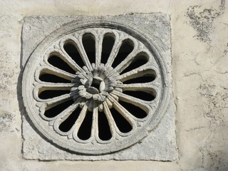 The rosette of a church in Monte Saint Angelo in Italy