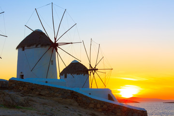 Windmills sunset Mykonos Island Greece Cyclades