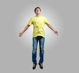 Young man dancing and jumping