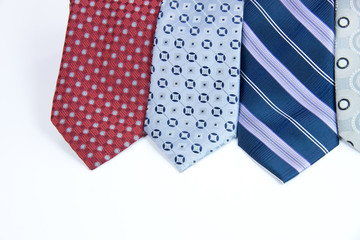 Selection of business silk ties isolated on white