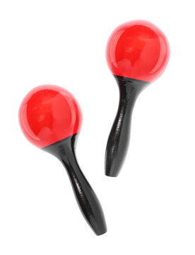 Wooden maracas rattle on a white background.