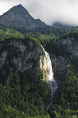 Waterfall in Switzerland mountains - obrazy, fototapety, plakaty