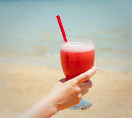 Fresh fruit cocktail on a tropical island beach