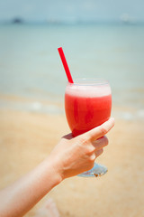 Fresh fruit cocktail on a tropical island beach