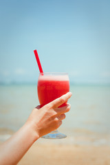 Fresh fruit cocktail on a tropical island beach