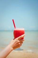 Fresh fruit cocktail on a tropical island beach