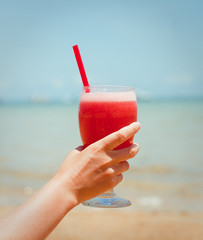 Fresh fruit cocktail on a tropical island beach