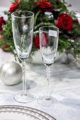 Two wineglasses and bunch of roses