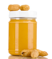 Delicious peanut butter in jar of peanut near isolated on white