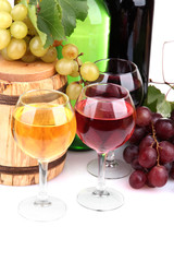 Barrel, bottles and glasses of wine, grapes, isolated on white