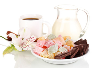 White cup of Turkish coffee with rahat delight and milk