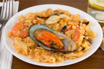 rice with mussels and shrimps on the plate