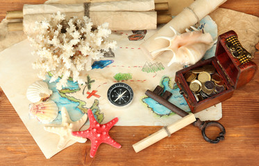 map of treasures on wooden background