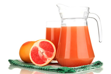 Full glass and jug of grapefruit juice and grapefruits isolated